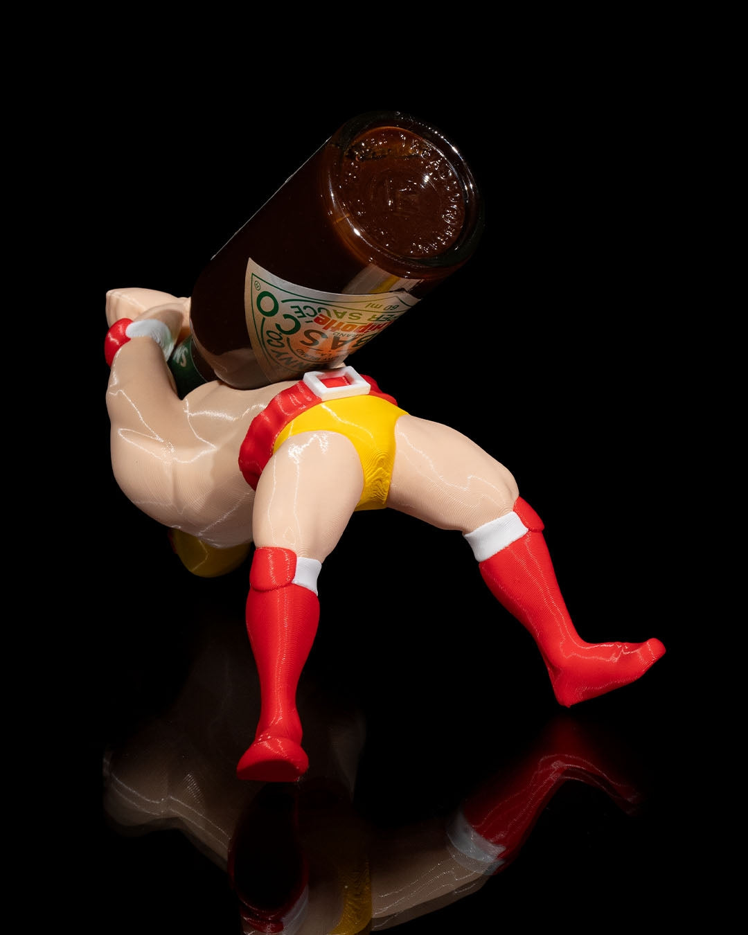 Le support Tabasco imprimé en 3D Luchador – Présentoir audacieux pour sauce piquante